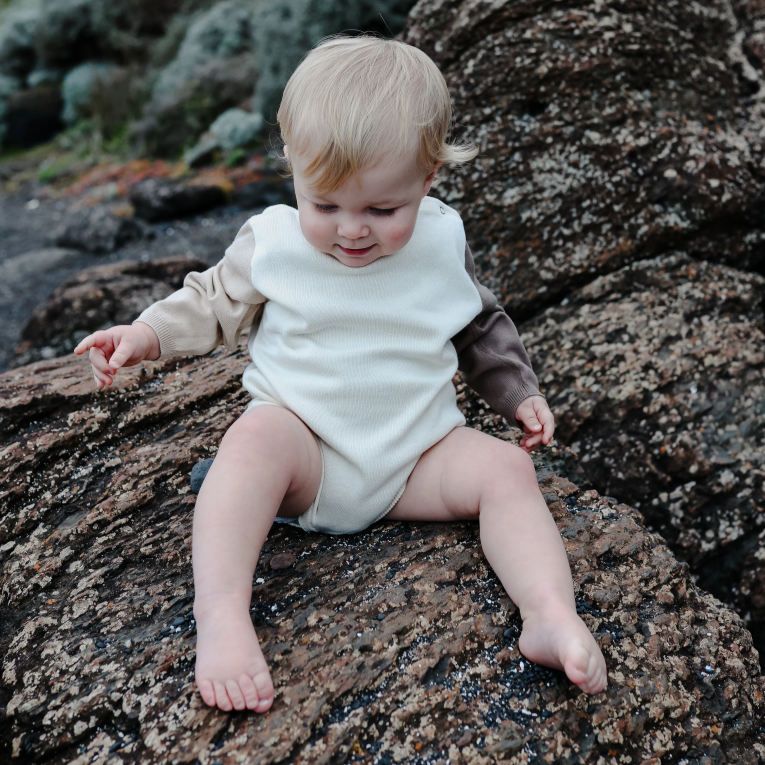 US stockist of Grown's organic cotton colorblock long sleeve romper