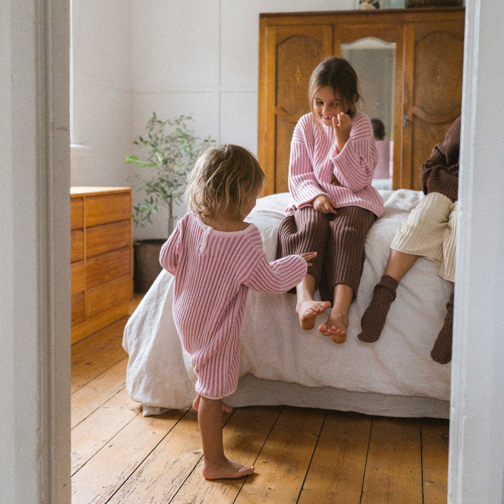 US stockist of Illoura the Label's long sleeve essential knit romper in Strawberry Stripe
