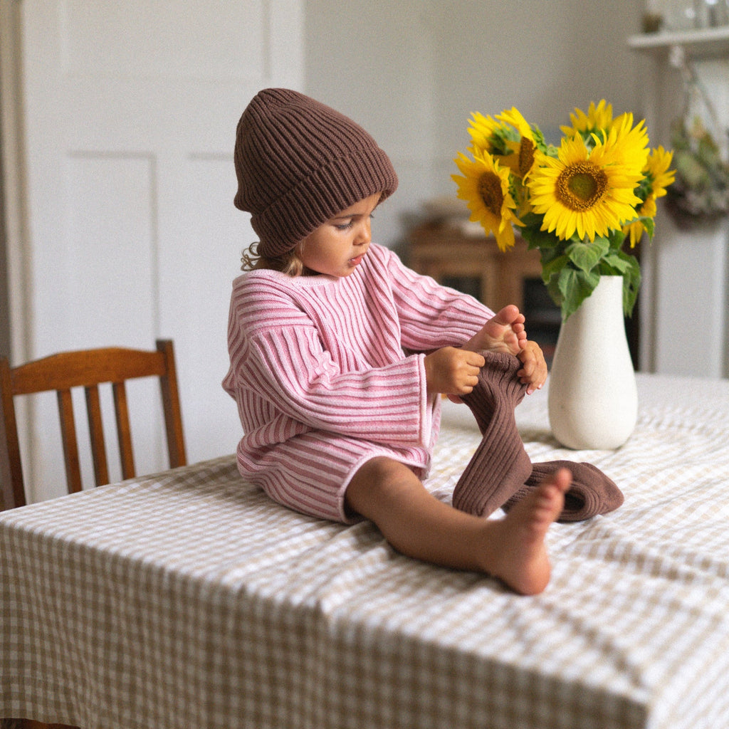 US stockist of Illoura the Label's long sleeve essential knit romper in Strawberry Stripe