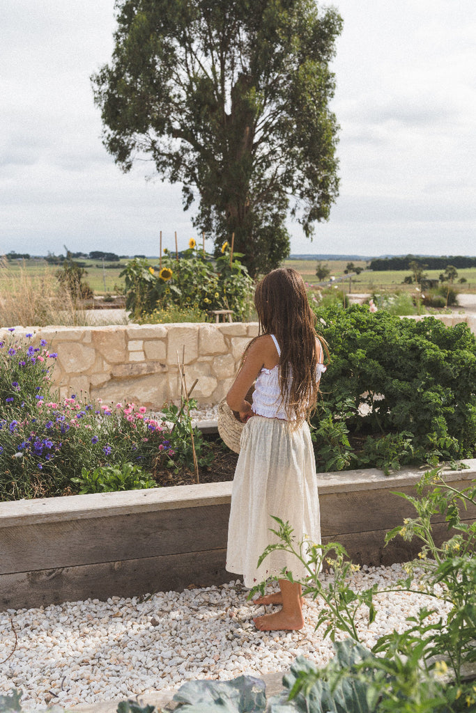 US stockist of Illoura the Label's White Shirred Crop Top