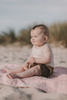 US stockist of Grown Clothing's hand crocheted romper in "Coconut"