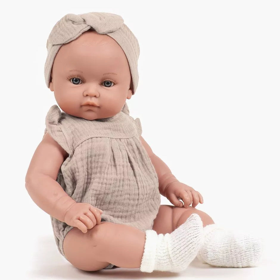 US stockist of Minikane's Yaelle Bambine doll dressed in Beige Cotton Romper set