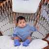 US stockist of Grown Clothing's knitted scallop romper in Cedar