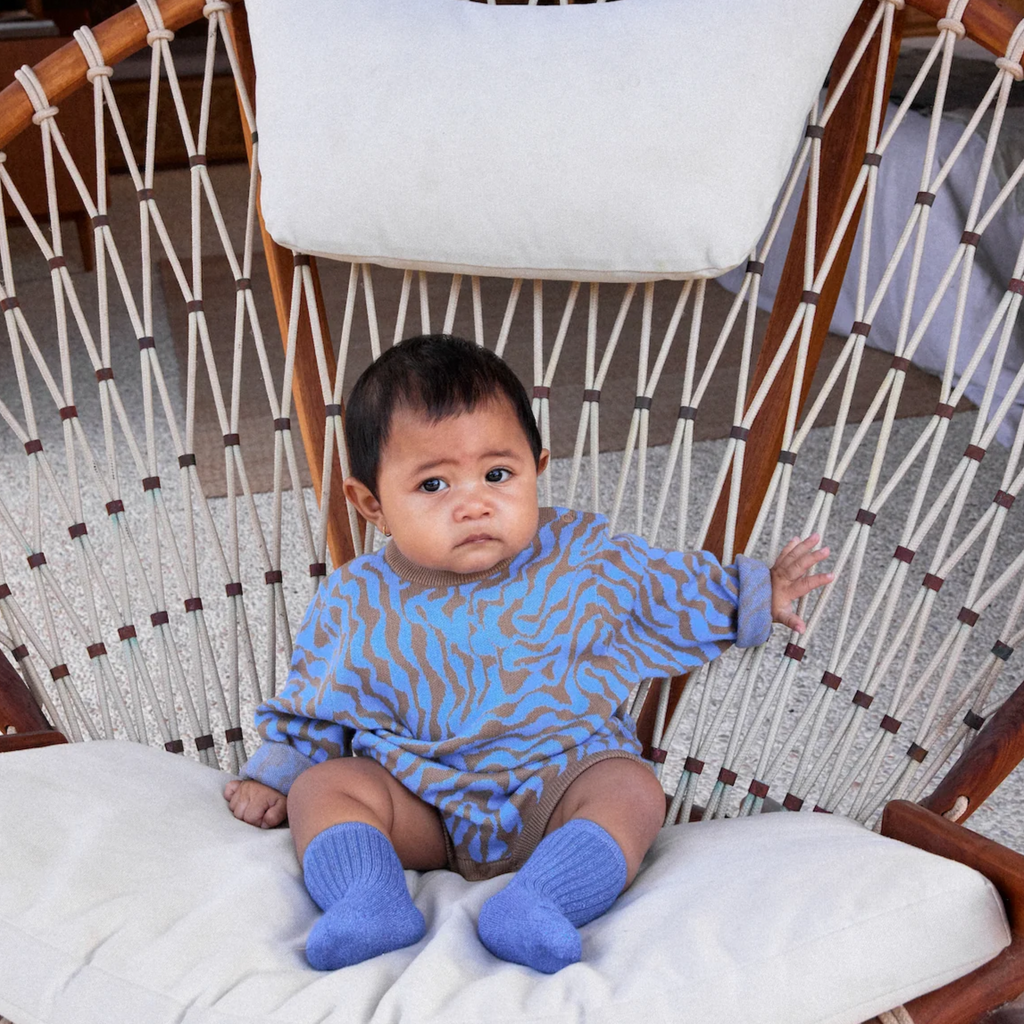 US stockist of Grown Clothing's knitted scallop romper in Cedar