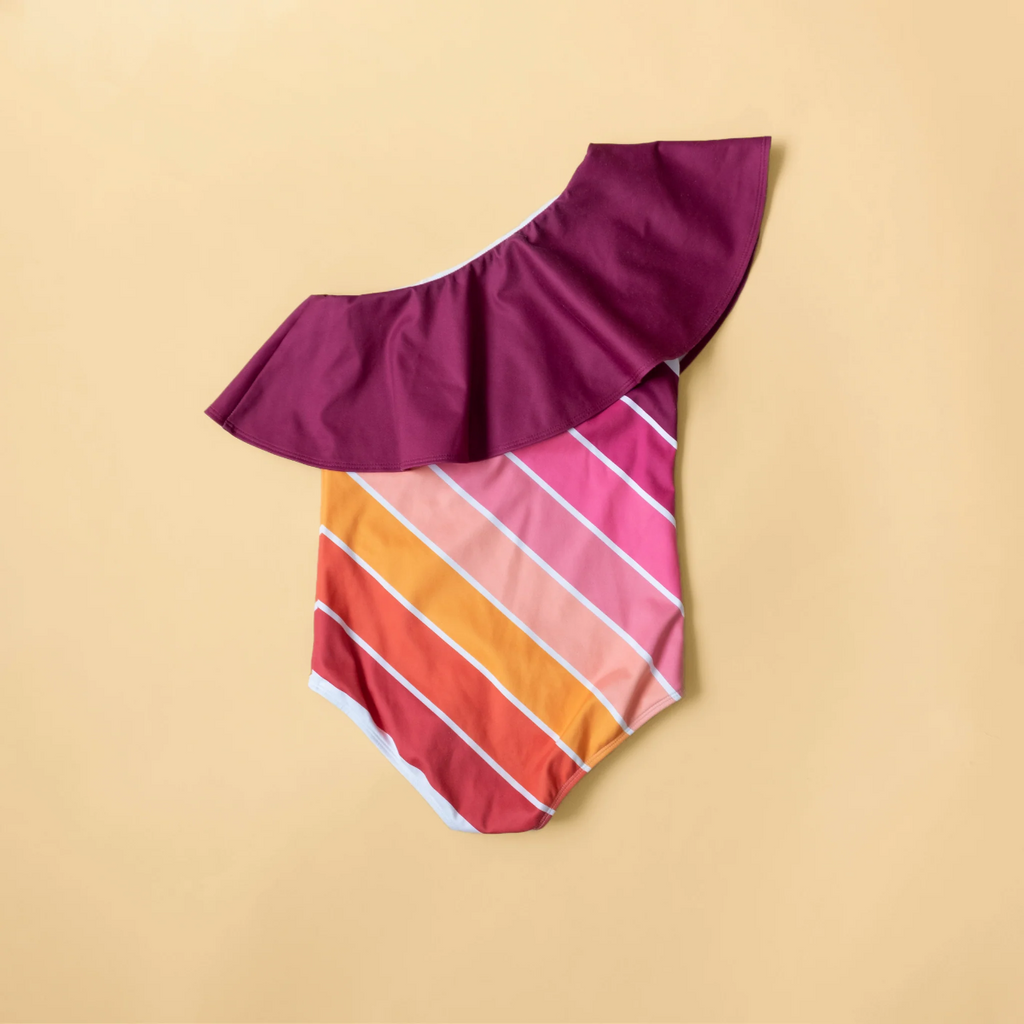 US stockist of Saint Ida's Sunset Beach Rainbow One Shoulder Ruffle Swimsuit