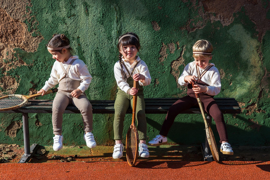 US stockist of Silly Silas' Retro Champs footless cotton tights in Oyster Grey with striped braces.