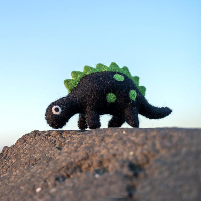 US stockist of Tara Treasures' felt black dinosaur with green spikes