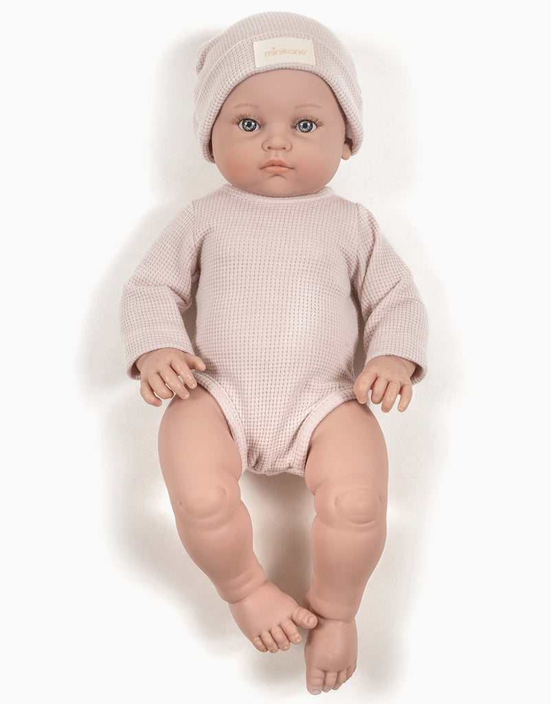 US stockist of Minikane's Bambini Andrea long sleeve bodysuit with matching hat in Petal