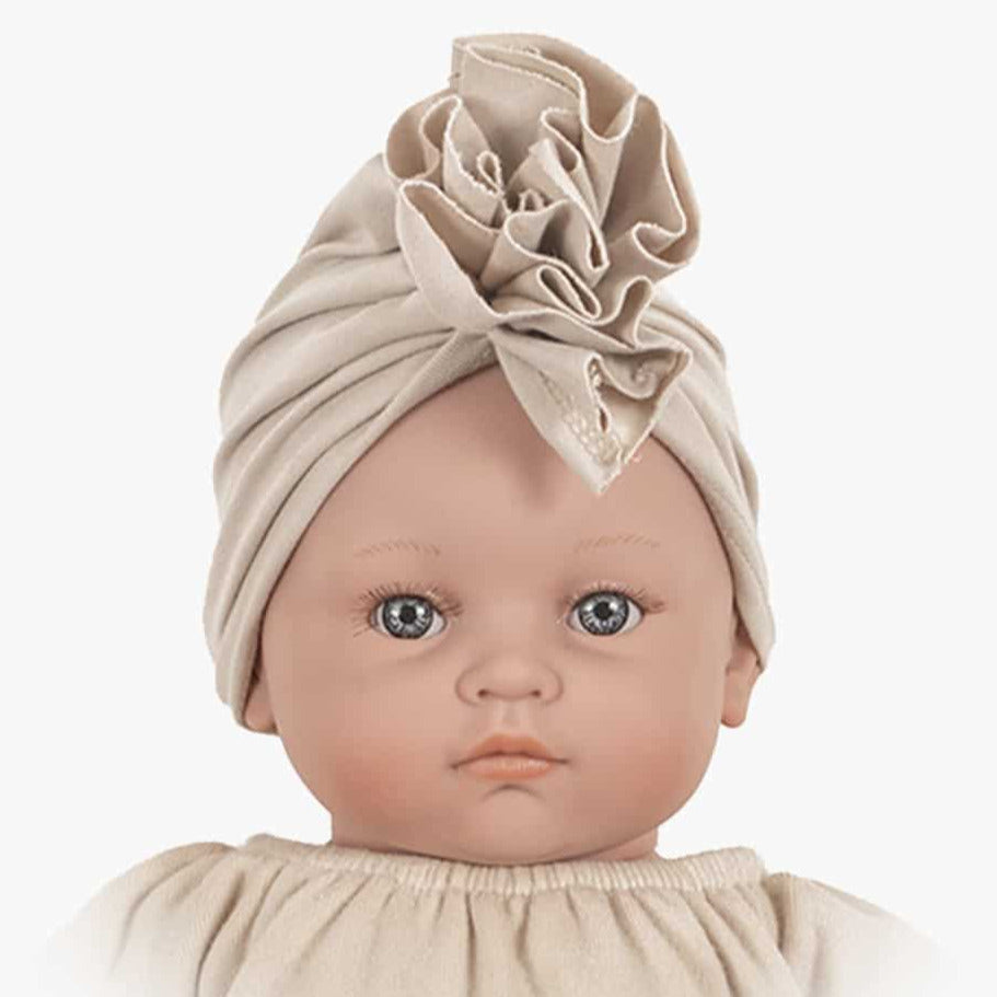 US stockist of Minikane Bambinis Flower Turban in Linen Jersey