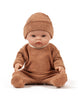 US stockist of Minikane's Octave Cuties doll dressed in Brown Sugar sleepsuit with matching Tico hat.