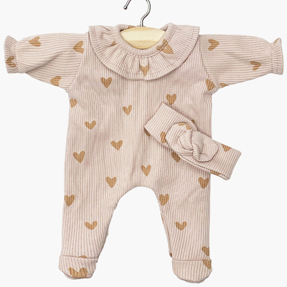 US stockist of Minikane's Babies Camille Pink Sleepsuit and headband with a heart print