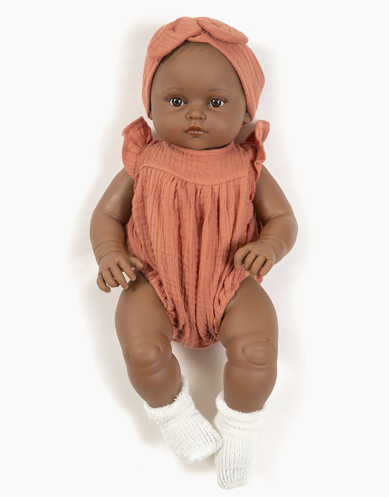 US stockist of Minikane's Augustine Bambini girl doll in her Marsala Romper with matching headband
