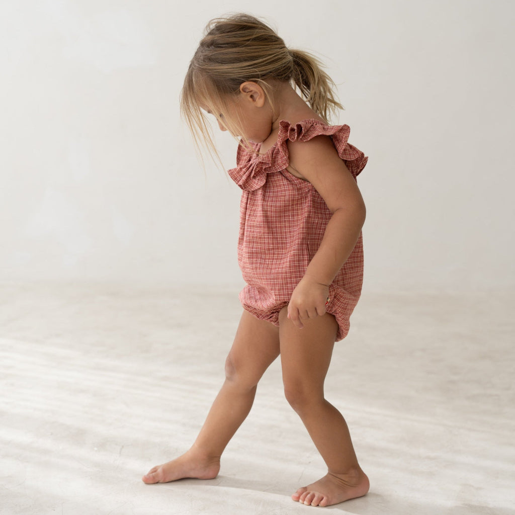 US stockist of Illoura the Label's Red Plaid Pip Romper