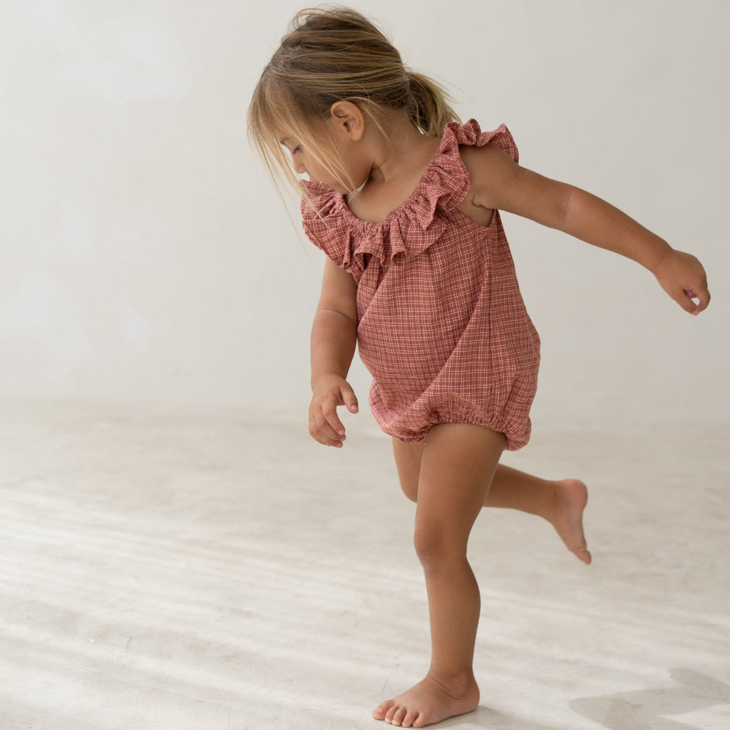 US stockist of Illoura the Label's Red Plaid Pip Romper