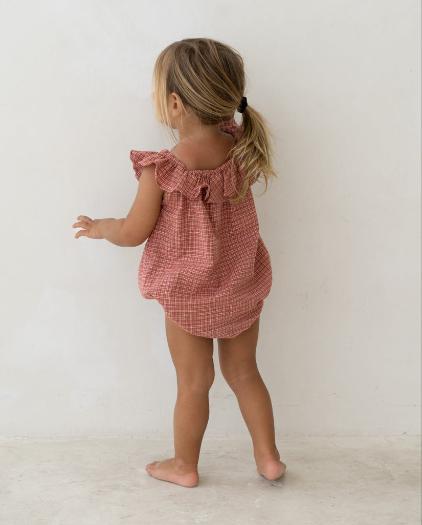 US stockist of Illoura the Label's Red Plaid Pip Romper