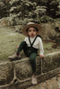US stockist of Silly Silas' gender neutral, organic cotton footed tights in Dark Forest Green.