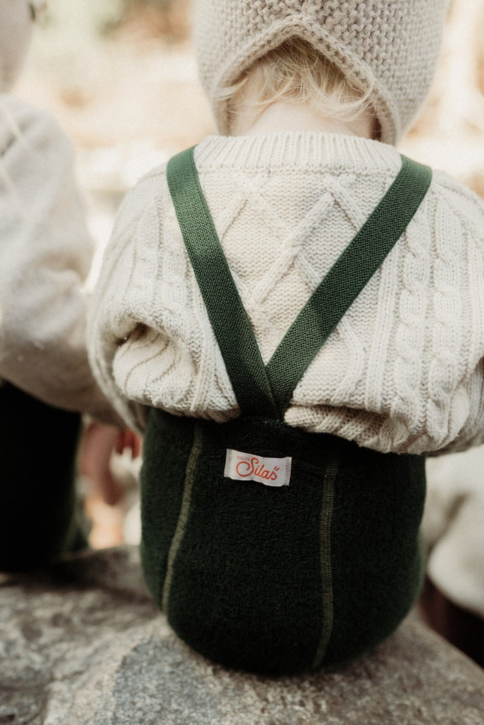US stockist of Silly Silas' gender neutral, Teddy footed warmy tights in Dark Forest Green.