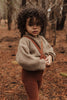 US stockist of Silly Silas' gender neutral, footless Teddy tights in Cinnamon.  Made from 100% okeo tex cotton with retro braces.