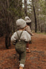 US stockist of Silly Silas' gender neutral, footless Teddy tights in Olive.  Made from 100% okeo tex cotton with retro braces.