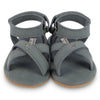 US stockist of Donsje USA's Giggles premium handmade leather nubuck sandals.  Petrol Grey in color with velcro fastening at back.  Sizes 0-12 mths have soft sole, 12-30mths have a soft flexible, rubber sole.