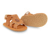US stockist of Donsje USA's Poppy Tuti Fields premium handmade leather sandals.  Tan in color with a lovely tan sunflower on front and velcro fastening at back.  Sizes 0-12 mths have soft sole, 12-30mths have a soft flexible, rubber sole.