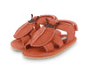 US stockist of Donsje USA's Lady Bird Tuti Sky  premium handmade leather sandals.  Red in color with beautiful lady bird on front and velcro fastening at back.  Sizes 0-12 mths have soft sole, 12-30mths have a soft flexible, rubber sole.