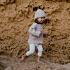 US stockist of Grown Clothing's gender neutral, Ecru  rib chunky knit sweater.  Features a drop shoulder and made from 100% cotton.