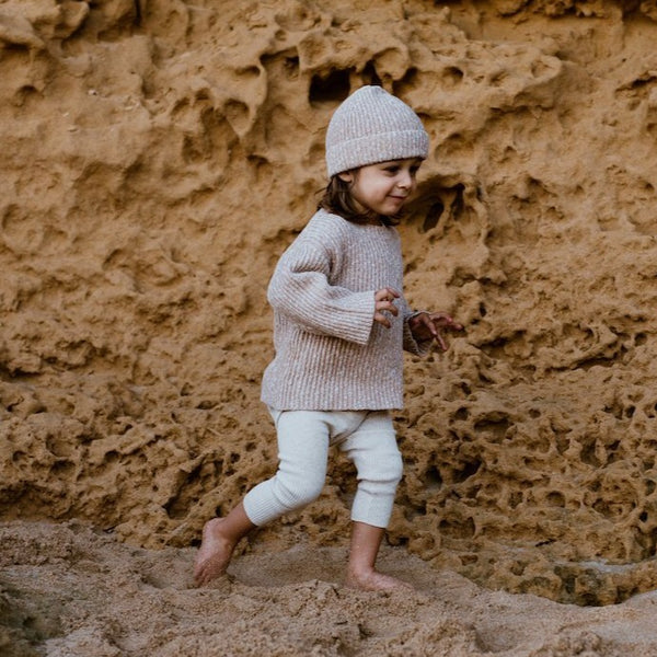 US stockist of Grown Clothing's gender neutral, Ecru  rib chunky knit sweater.  Features a drop shoulder and made from 100% cotton.