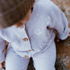US stockist of Grown Clothing's Ribbed Flower Cardigan in Violet Marle.  Features beautiful embroidered flowers on front.