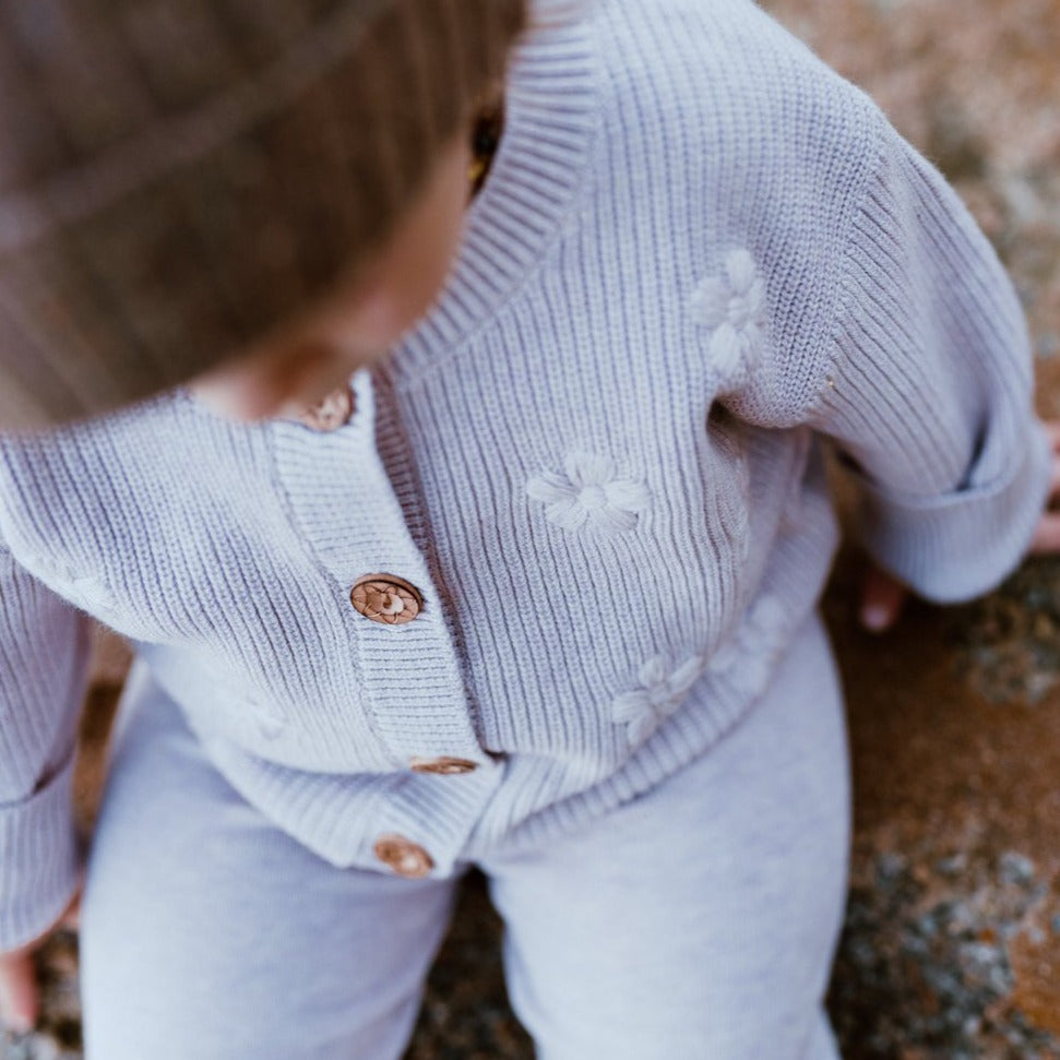 US stockist of Grown Clothing's Ribbed Flower Cardigan in Violet Marle.  Features beautiful embroidered flowers on front.