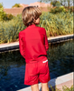 US stockist of Canopea's long sleeved, gender neutral, Turbot rash top in Pepper Red.