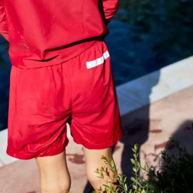 US stockist of Canopea's quick dry Diego swim short in Pepper Red.