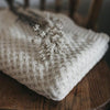US stockist of Snuggle Hunny Kids cream cotton diamond blanket