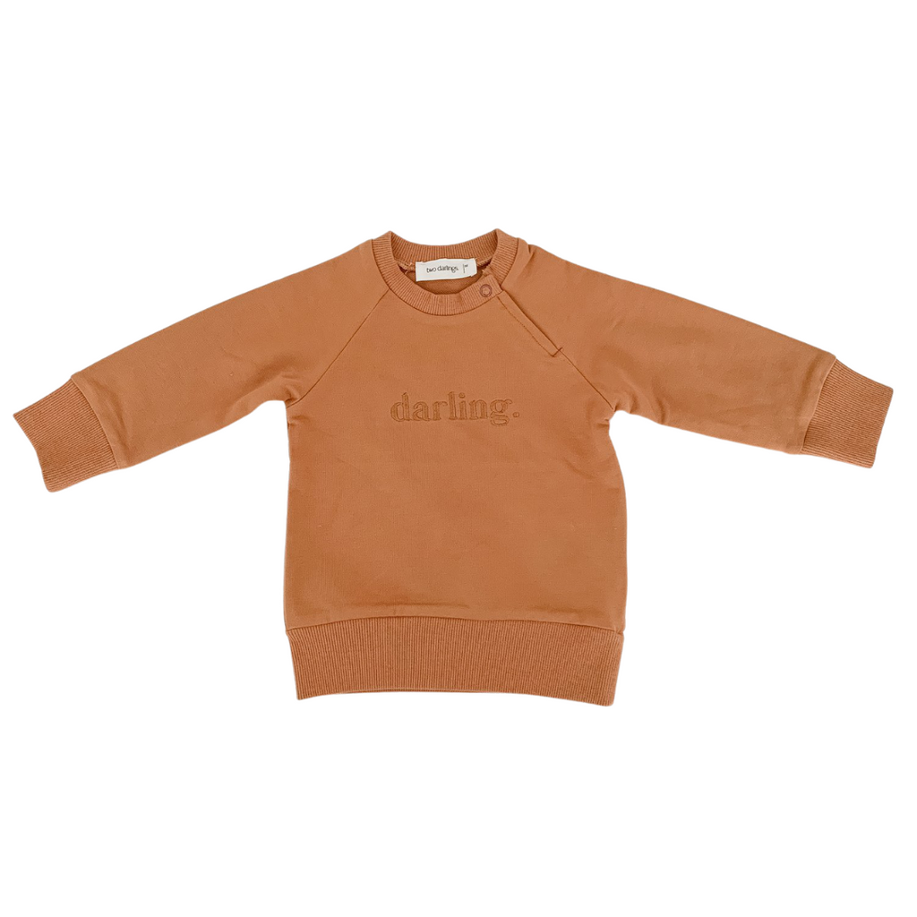 US stockist of Two Darling's cotton "Darling" sweatshirt in rust.