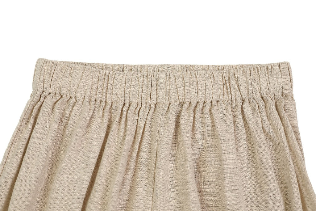 US stockist of Donsje's linen blend, Gwenda Bloomers in Beige.  Features a ruffle hem.