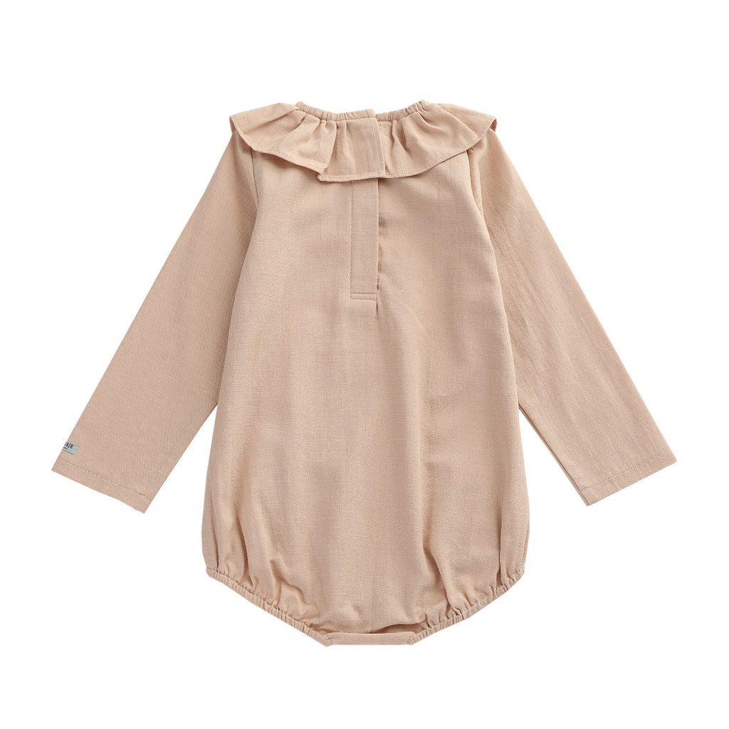 US stockist of Donsje's long sleeve chloe bodysuit in Crystal Pink.  Made from cotton with a ruffle neck.