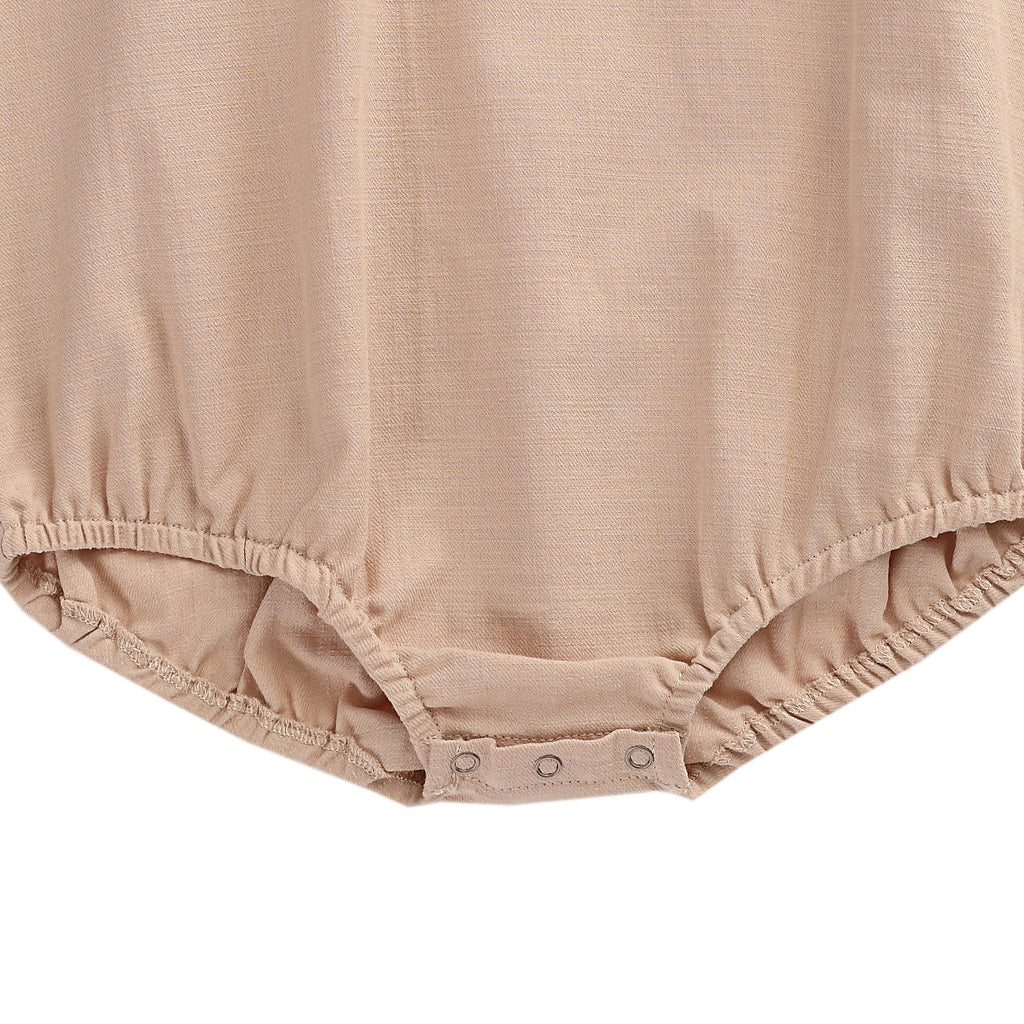 US stockist of Donsje's long sleeve chloe bodysuit in Crystal Pink.  Made from cotton with a ruffle neck.