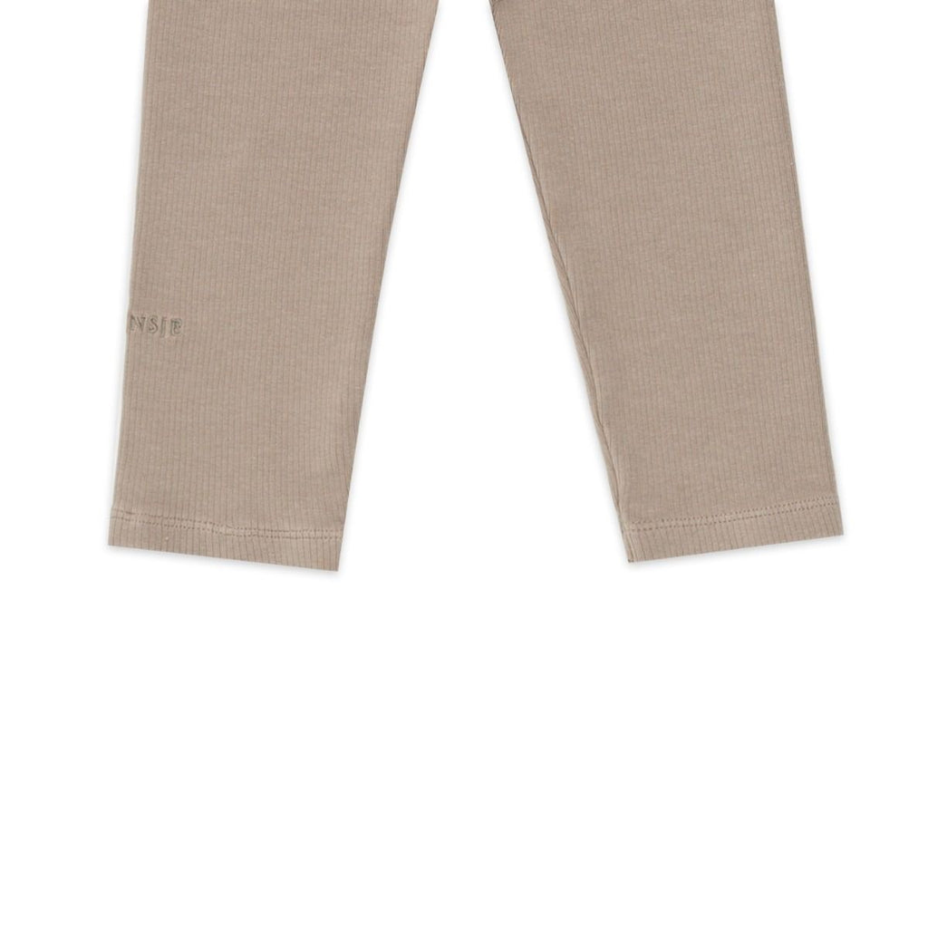 US stockist of Donsje's gender neutral, Dena ribbed suspender leggings in Dark Taupe.