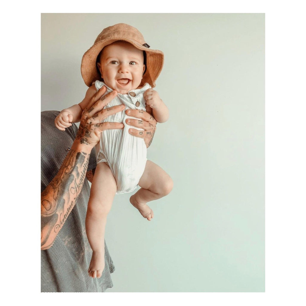 US stockist of Fini the Label's tan bucket hat made from soft terry towelling fabric.