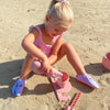 US stockist of Scrunch's silicone Snail Water Measurer in Dusty Rose.