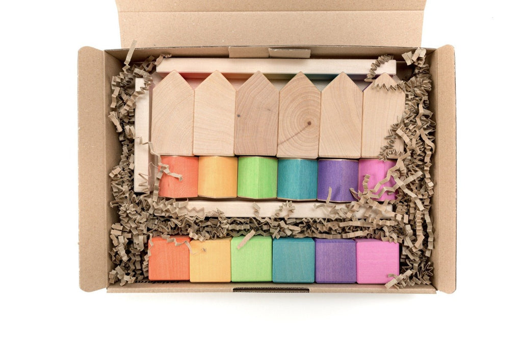 US stockist of Ocamora's Little Houses & Cubes.  Contains 18 colored pieces with its own tray.