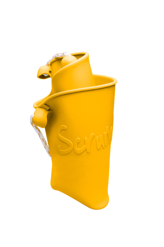 US stockist of Scrunch's mustard bucket.  Made from non-toxic, food grade silicone with a rope handle.