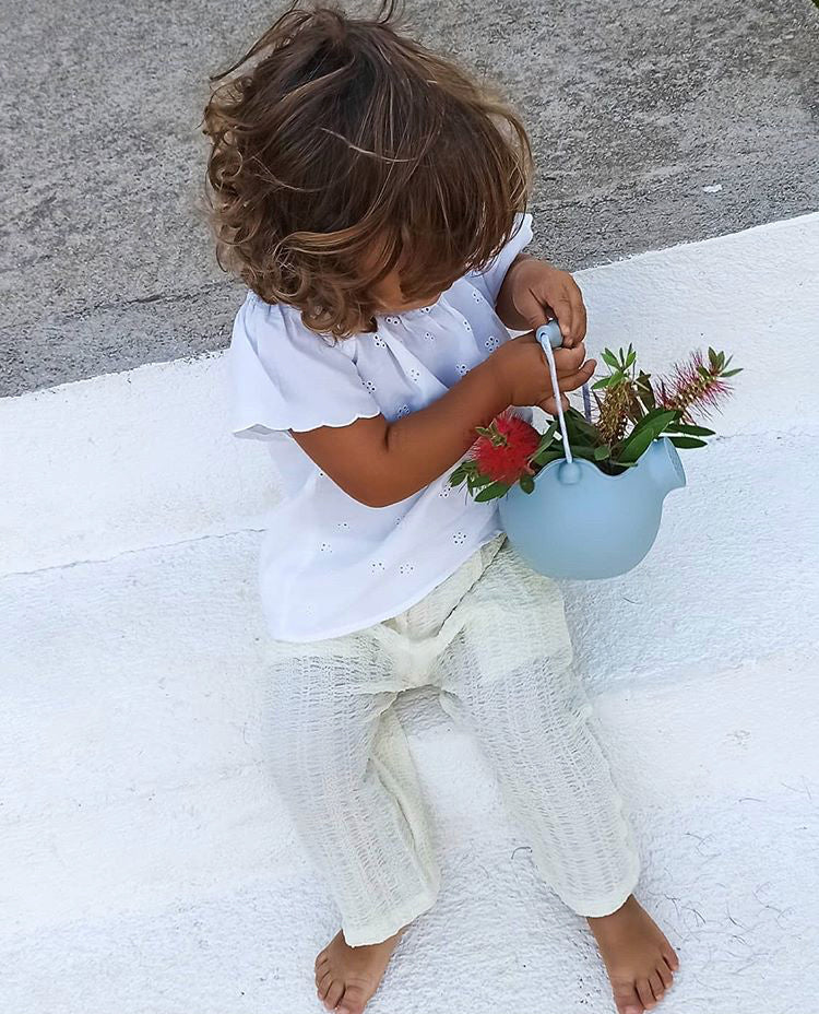 US stockist of Scrunch's duck egg blue silicone watering can.