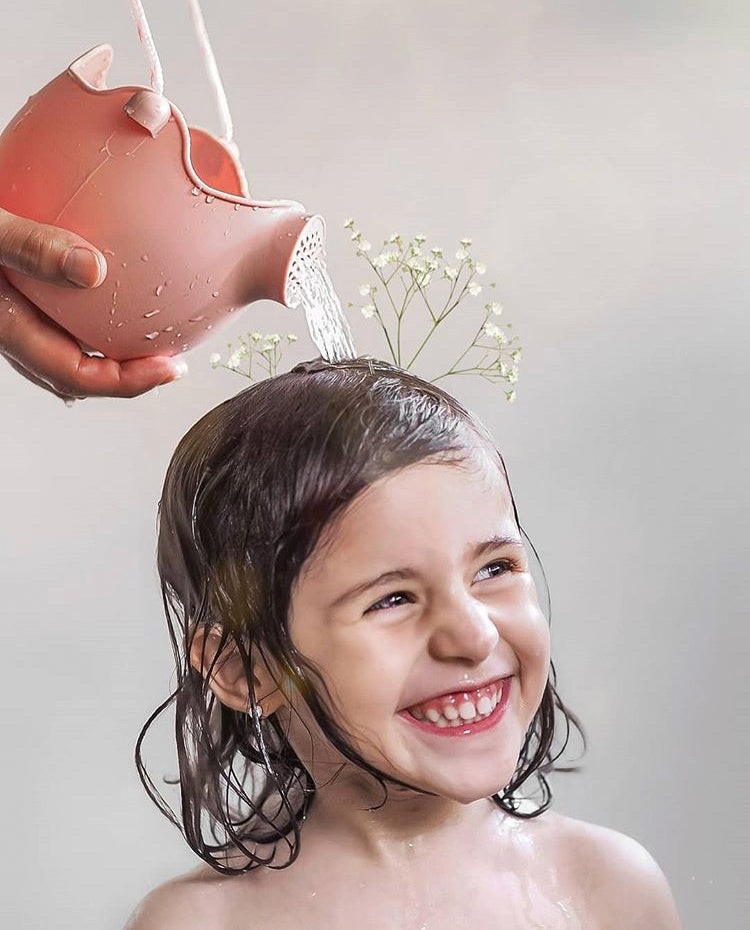 US stockist of Scrunch's dusty rose silicone watering can.
