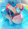 US stockist of Scrunch's dusty rose silicone watering can.