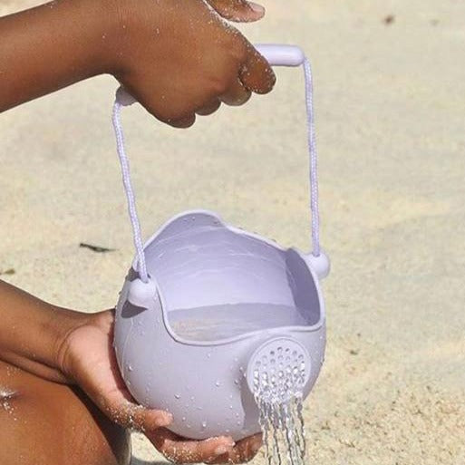 US stockist of Scrunch's light purple silicone watering can.