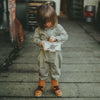 US stockist of Donsje's gender neutral Skivi Jumpsuit in Rough Sage.