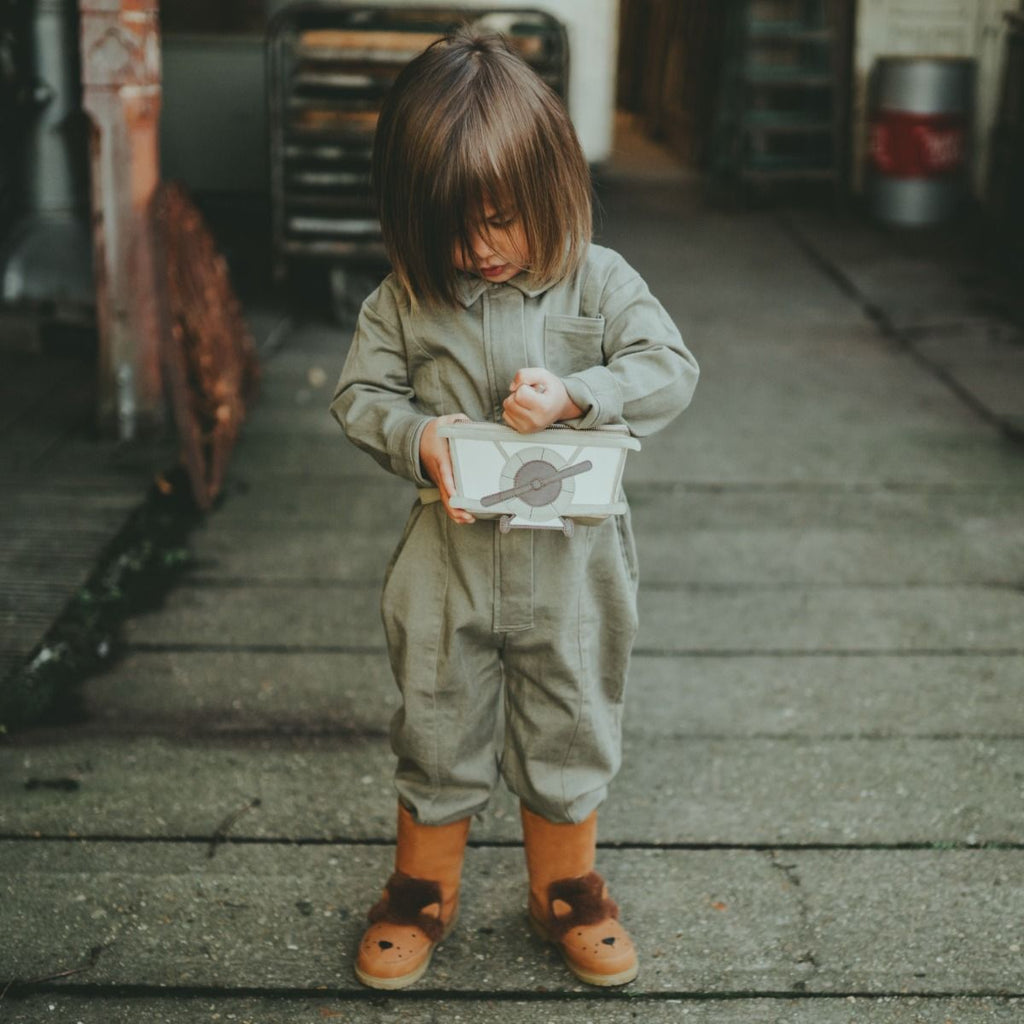 US stockist of Donsje's gender neutral Skivi Jumpsuit in Rough Sage.