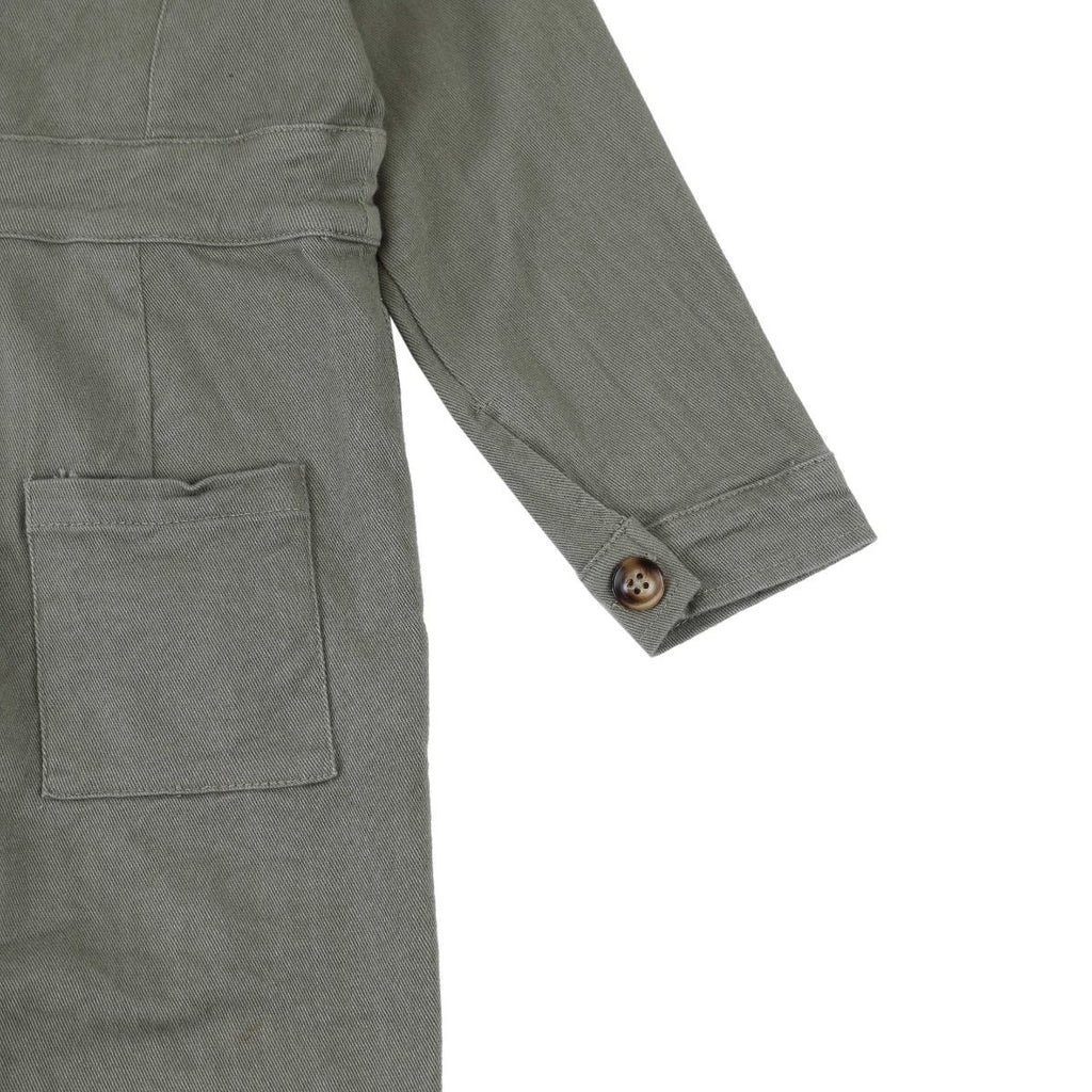 US stockist of Donsje's gender neutral Skivi Jumpsuit in Rough Sage.