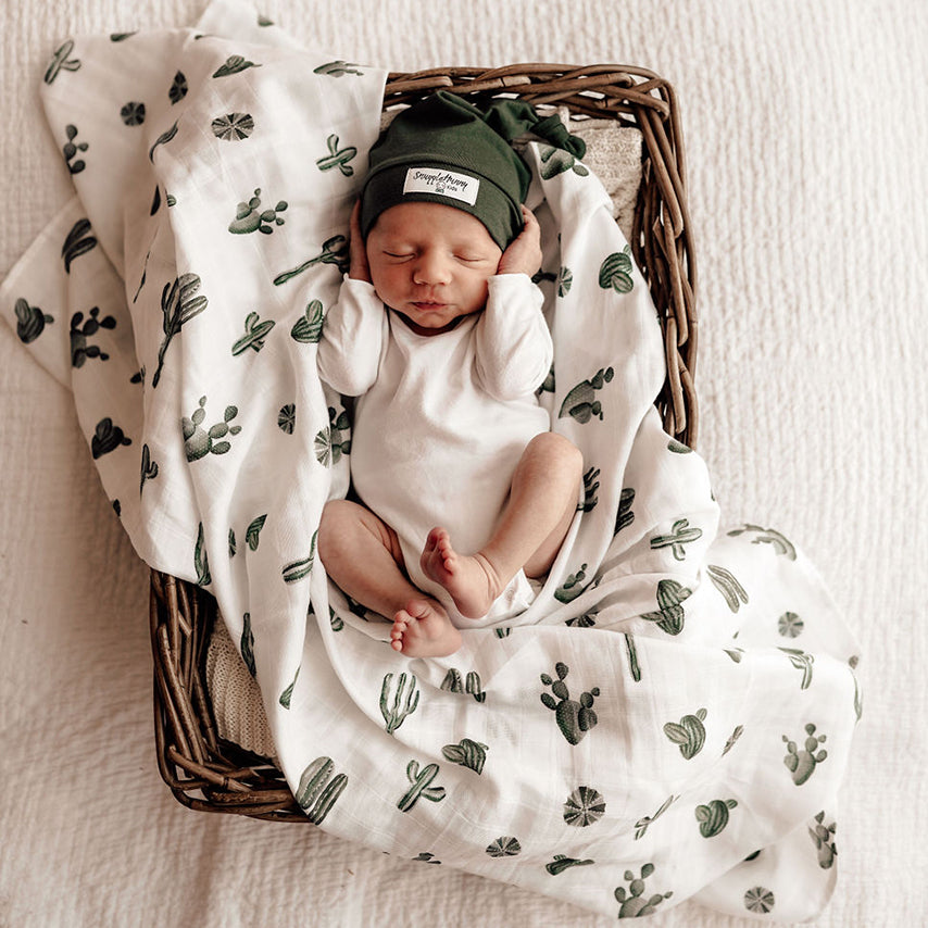 US stockist of Snuggle Hunny Kid's organic muslin wrap in Cactus.